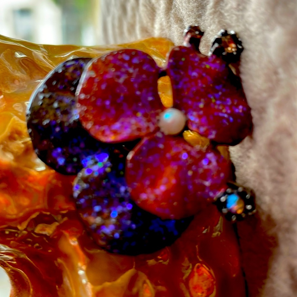 Pink and purple flower barrette by Yosac.